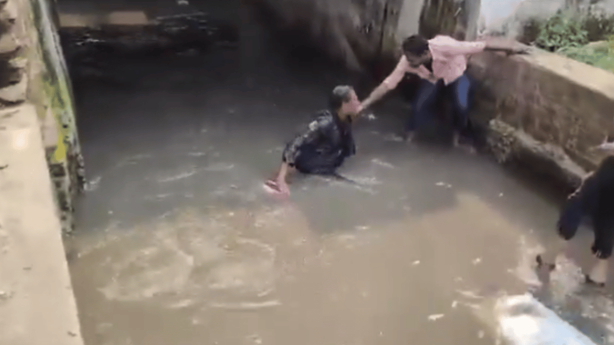 viral-video-bike-rider-crossing-submerged-road-under-bridge-fails-miserably-internet-questions-his-decision